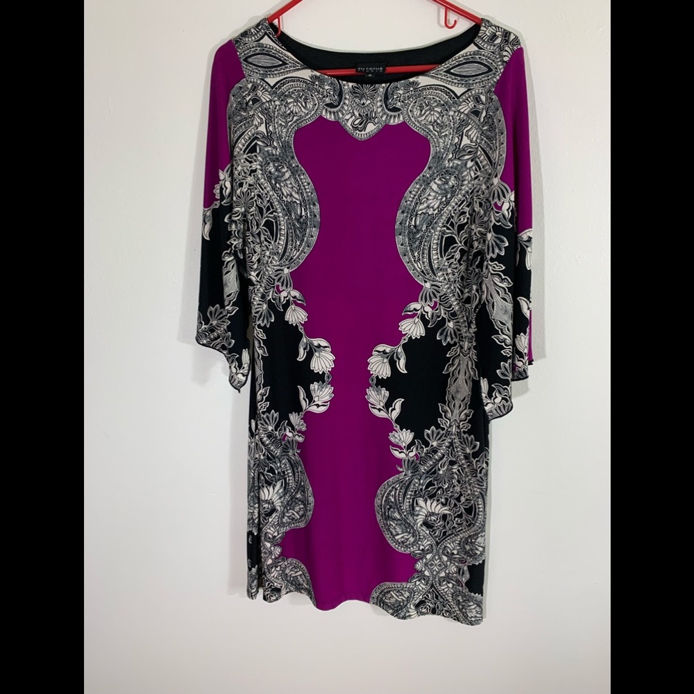 Size 8 med thigh  purple,black,white dress.